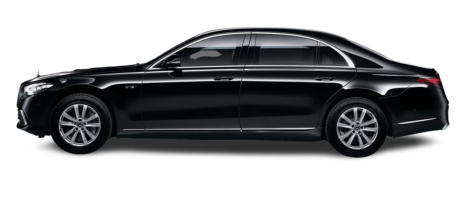 Professional chauffeur with black Mercedes sedan for corporate executive in Silicon Valley